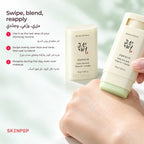 Beauty of Joseon Matte Sun Stick gliding across the back of a hand for a matte finish