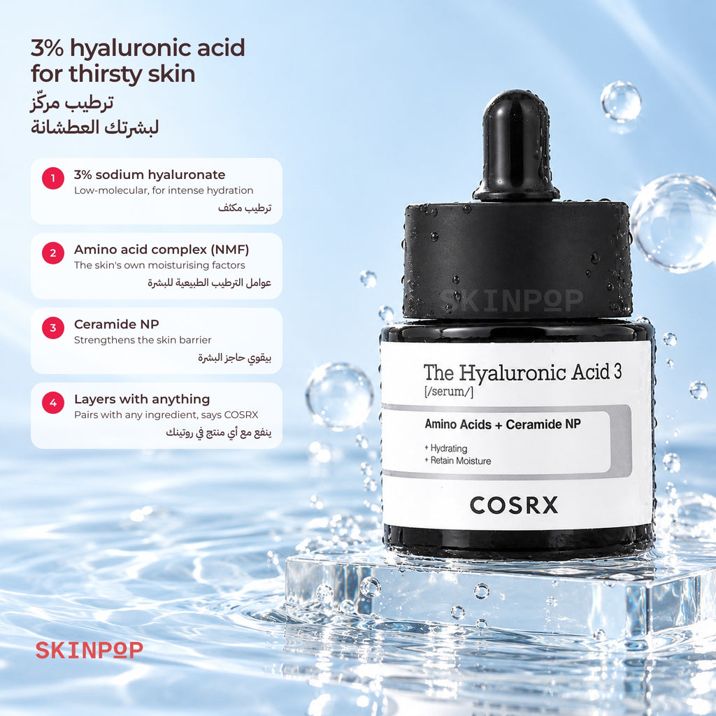 COSRX The Hyaluronic Acid 3 Serum standing in clear water with splashes and droplets