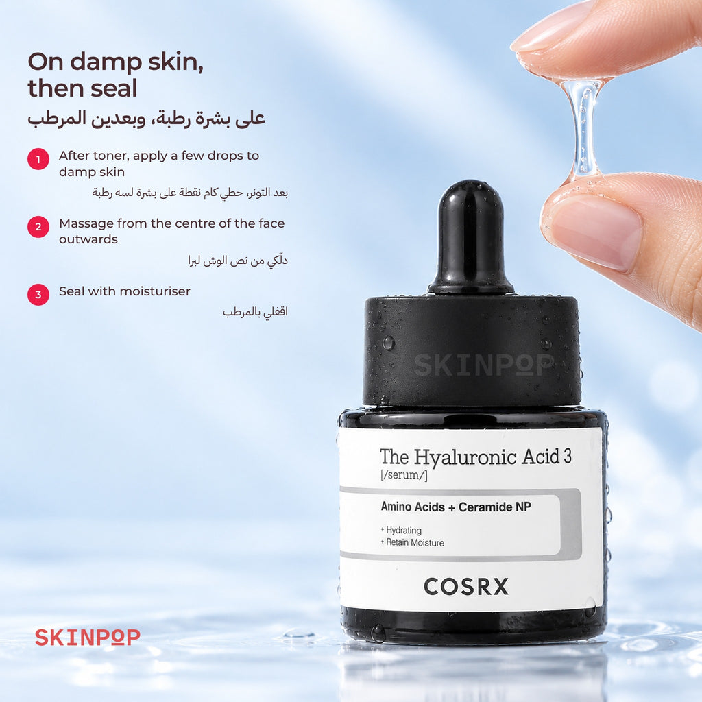 Drop of clear gel falling from a fingertip above the COSRX The Hyaluronic Acid 3 Serum