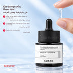 Drop of clear gel falling from a fingertip above the COSRX The Hyaluronic Acid 3 Serum