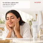 Woman splashing water on her face with the SKIN1004 Tone Brightening Cleansing Gel Foam on the counter