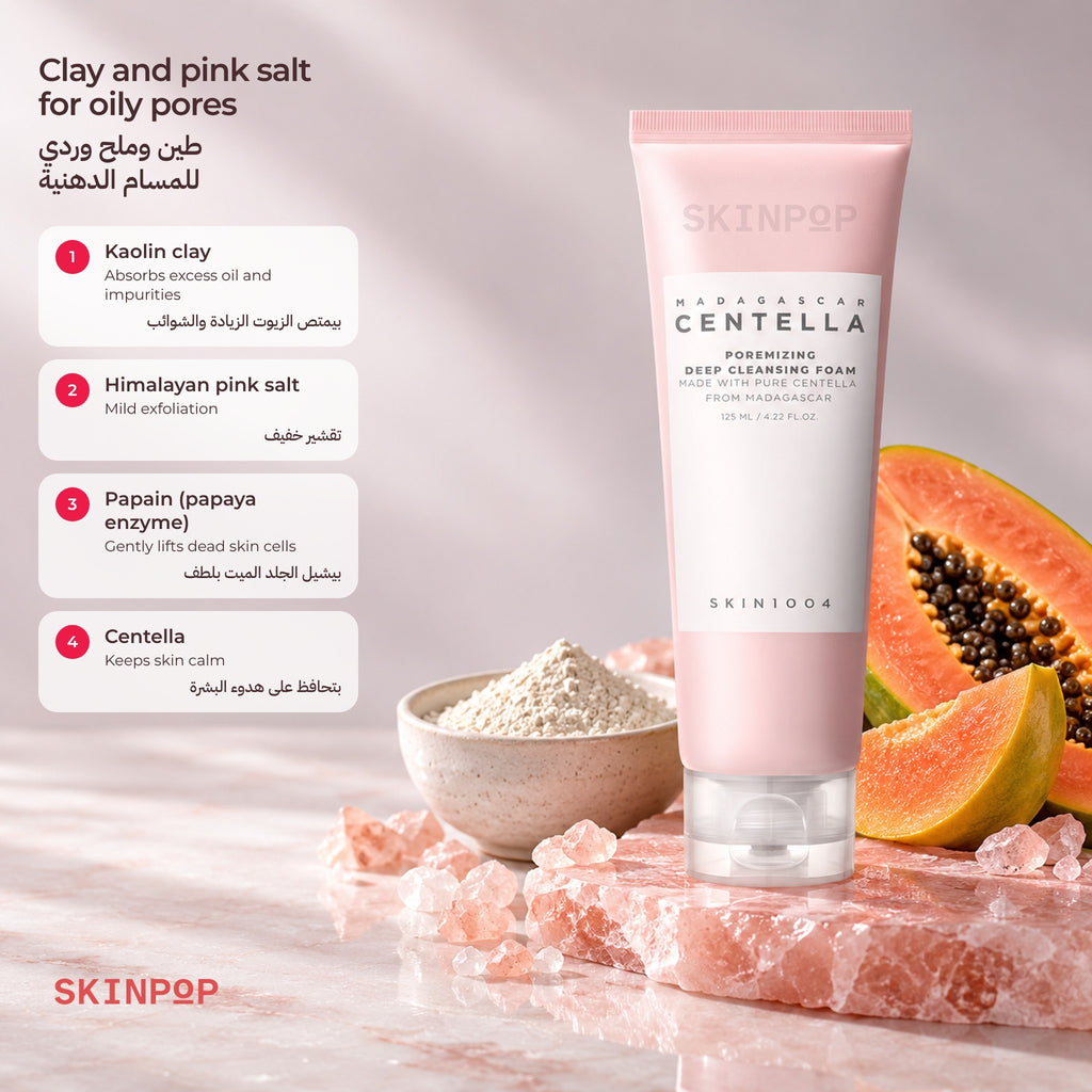 SKIN1004 Poremizing Deep Cleansing Foam with a papaya half, a bowl of clay and pink salt crystals