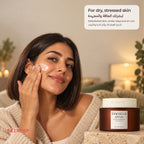 Woman with a bob applying cream to her cheek beside the SKIN1004 Probio-Cica Enrich Cream jar