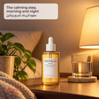 SKIN1004 Madagascar Centella Ampoule on a bedside table with a lamp, a plant and a glass of water