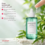 القطارة بتنزّل نقطة من أمبول SKIN1004 Tea-Trica Relief Ampoule جنب ورق أخضر