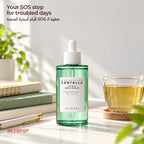 أمبول SKIN1004 Tea-Trica Relief Ampoule على مكتب جنب كتب وكوباية شاي زجاج