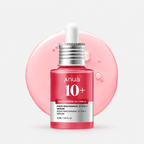 Anua Niacinamide 10+ Serum 30 ml red dropper bottle with pink serum swatch