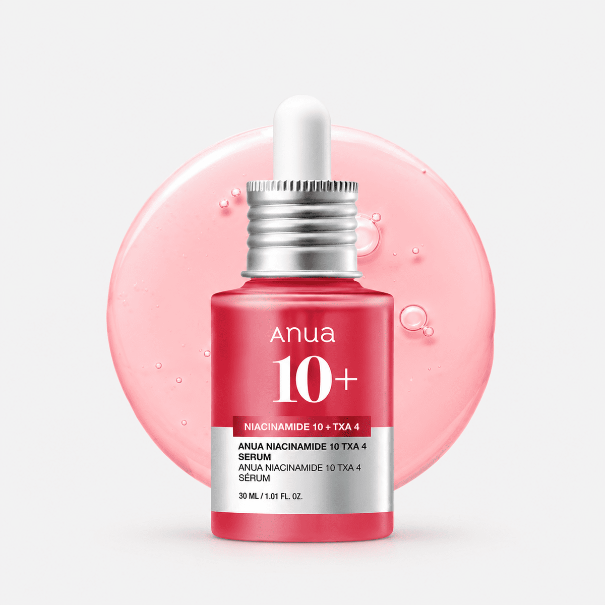 Anua Niacinamide 10+ Serum 30 ml red dropper bottle with pink serum swatch